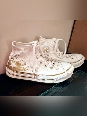 Converse White High-Top Sneakers with Gold Star Accents